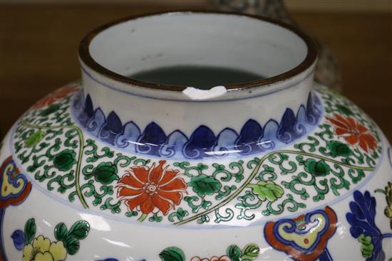 A Chinese wucai jar, a prunus and cracked ice vase and a bamboo brush pot tallest 32cm